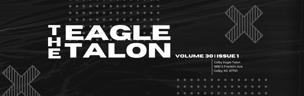 Black background with grey dots and striped x and white text "The Eagle Talon Volume 30 Issue 1 Colby Eagle Talon 1890 S Franklin Ave Colby, KS  67701"