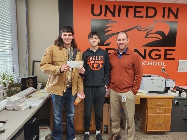 Mason and Max Kersenbrock, CHS students, presented a check to CHS Principal Ryan Muhlig on behalf of the Kersenbrock Family.